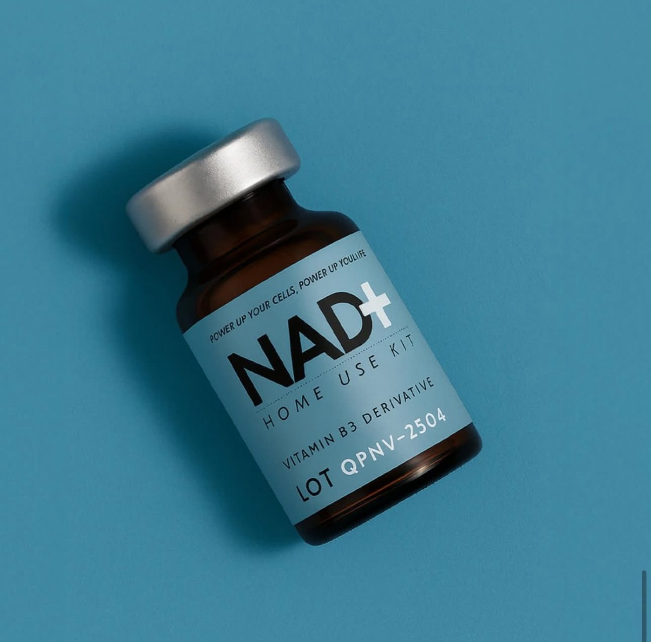 NAD⁺ Injectable Home Kit Vial on a green background