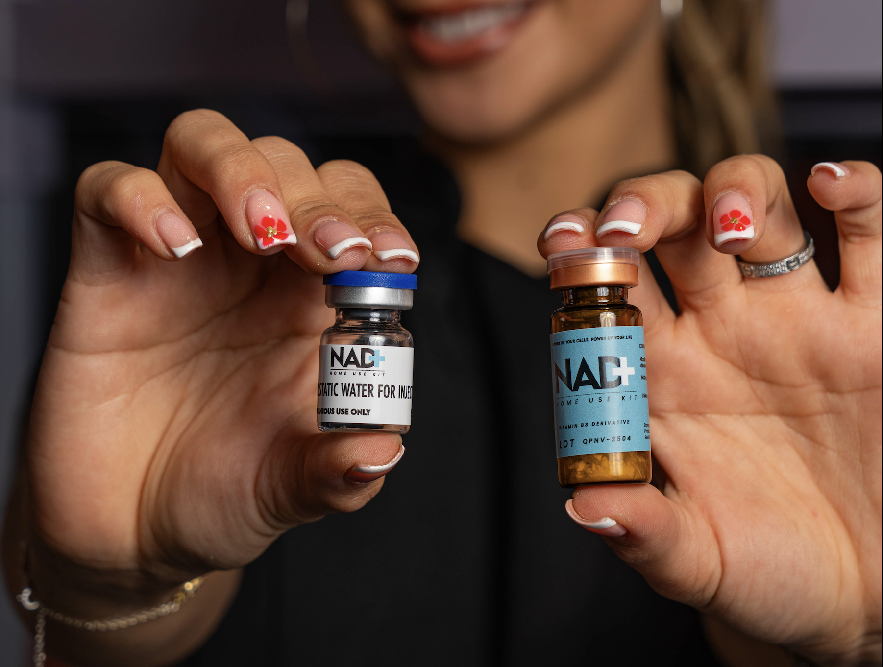 NAD⁺ Injectable (Home Kit) vials held by womans hand