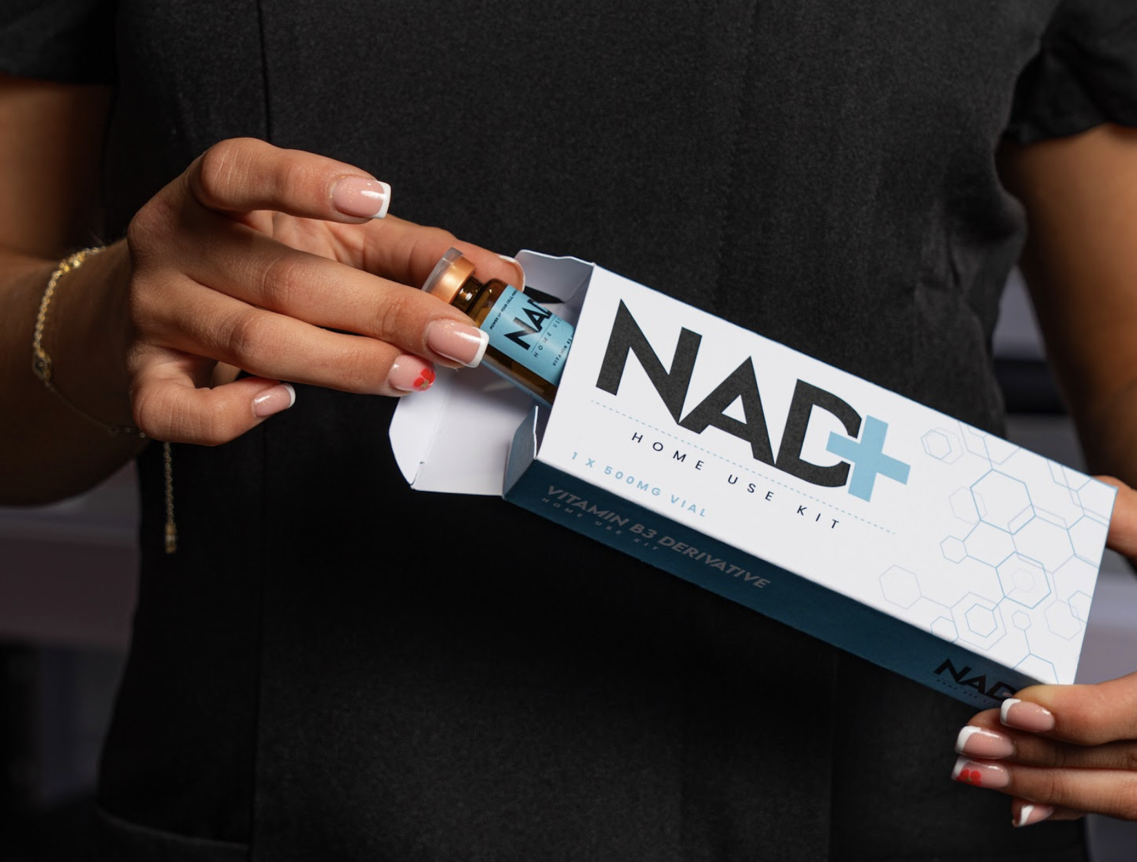 NAD⁺ Injectable (Home Kit) product box and vial being taken out of the box